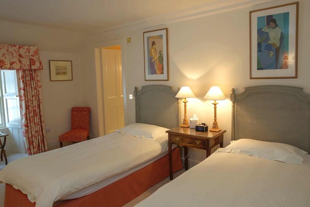 EDRADYNATE ESTATE COUNTRY HOUSE SPORTING ESTATE PERTHSHIRE SCOTLAND ACCOMMODATION TWIN BEDROOM ENSUITE 02 A colour image of a twin room with ensuite at Edradynate Country House and Sporting Estate Scotland. Edradynate is available for rent, shoot days, fishing and family holidays on a catered or self catered basis.